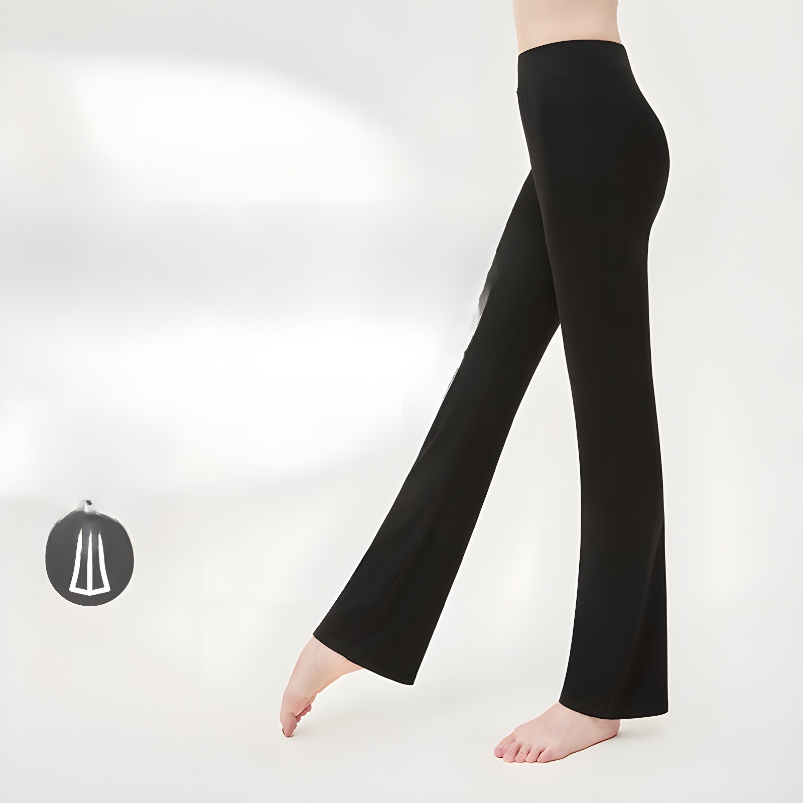 Side profile view emphasizing the micro-flared hem and elongated leg line