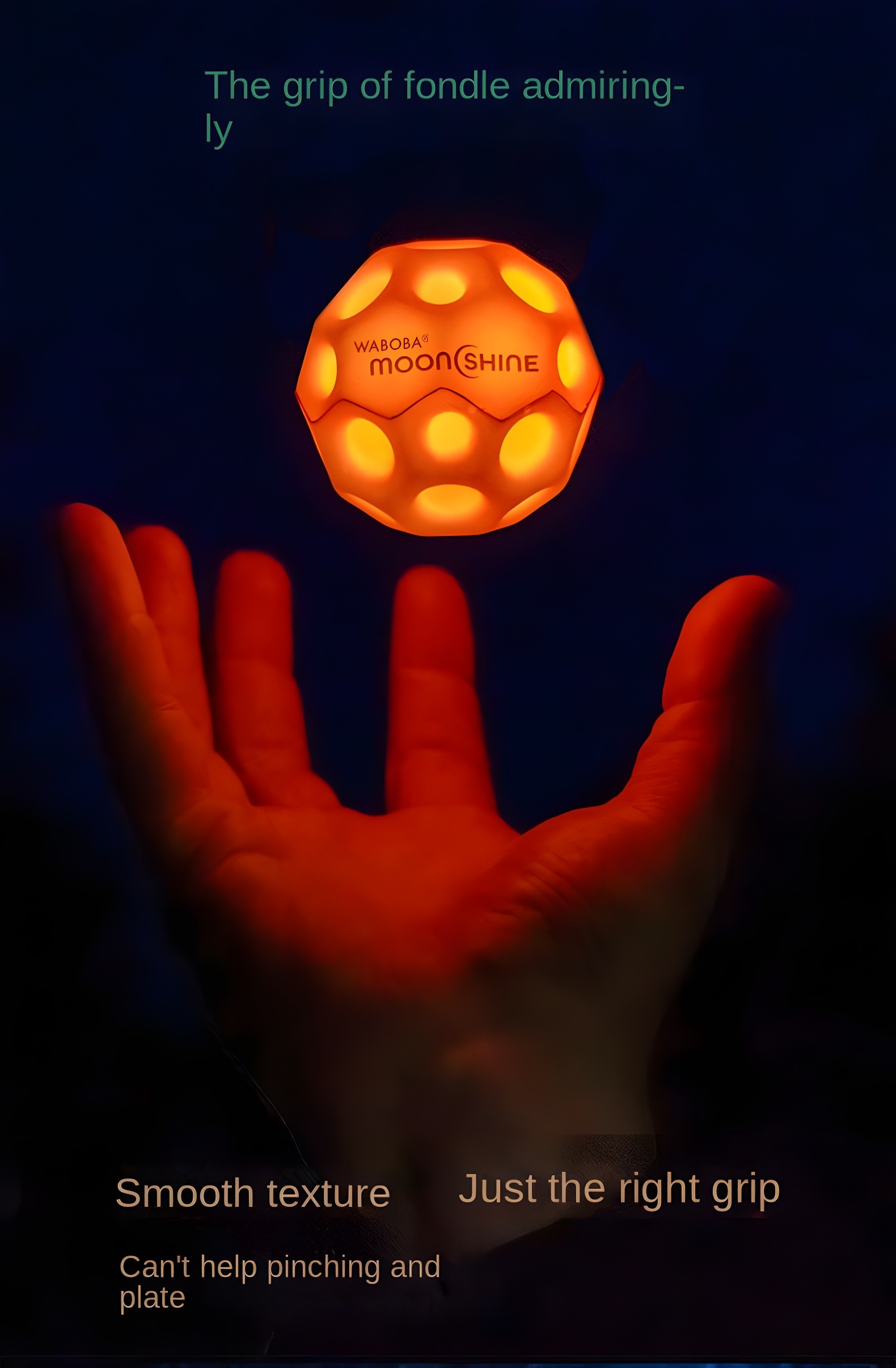 A hand holding a glowing orange Waboba Moon Ball, highlighting its smooth texture and perfect grip.