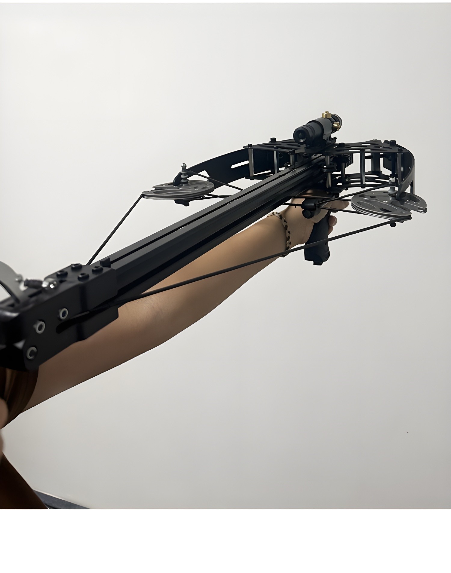 Close-up of the composite bow with laser sight activated