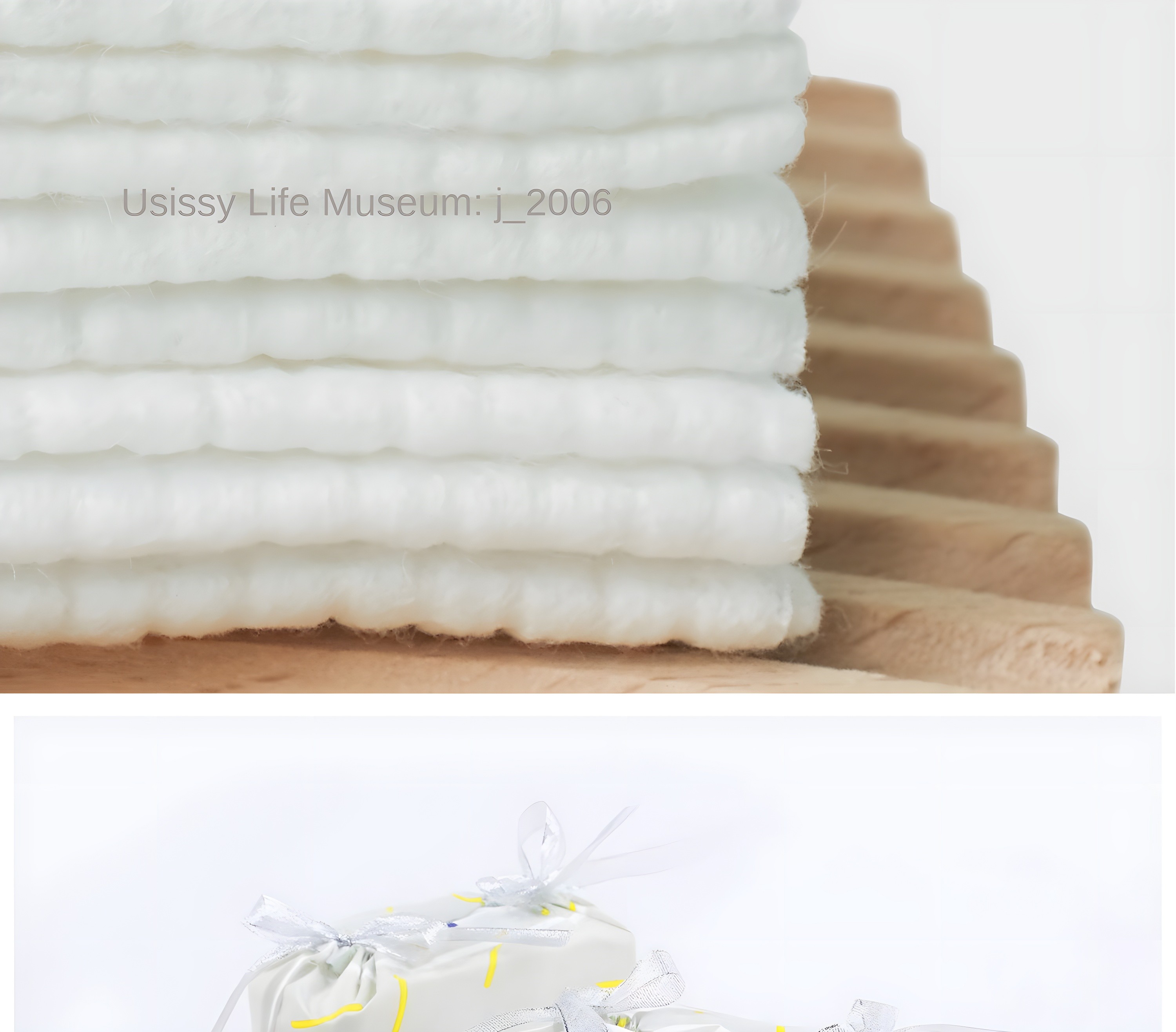 Stack of U-sissy cotton towels showing texture and layers