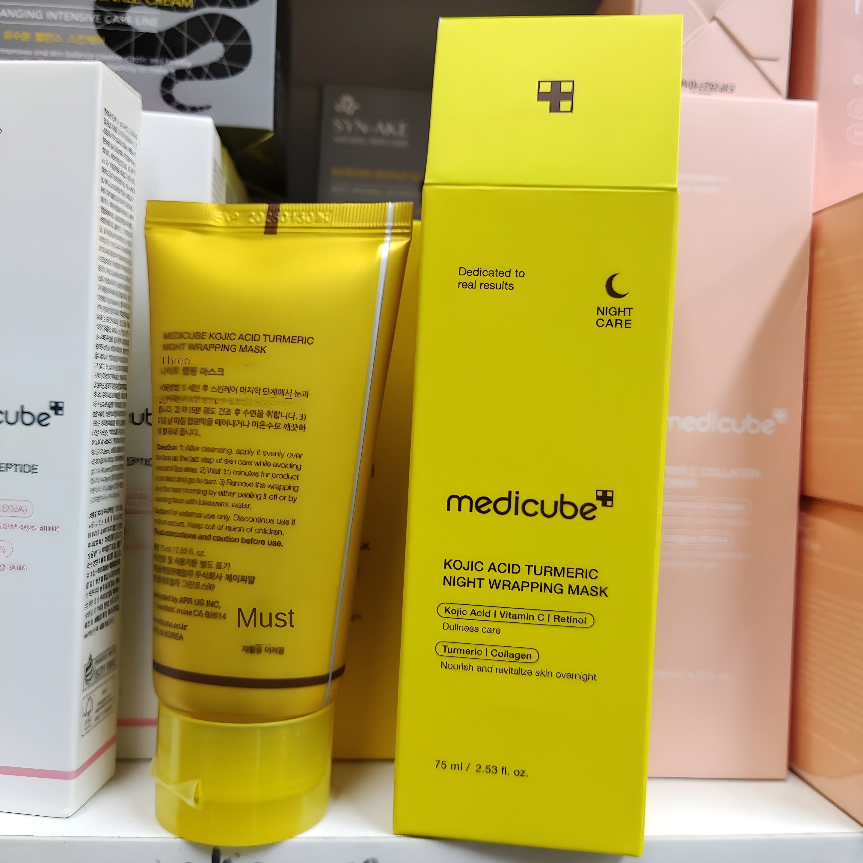 Medicube Kojic Acid Turmeric Night Wrapping Mask in Black and White