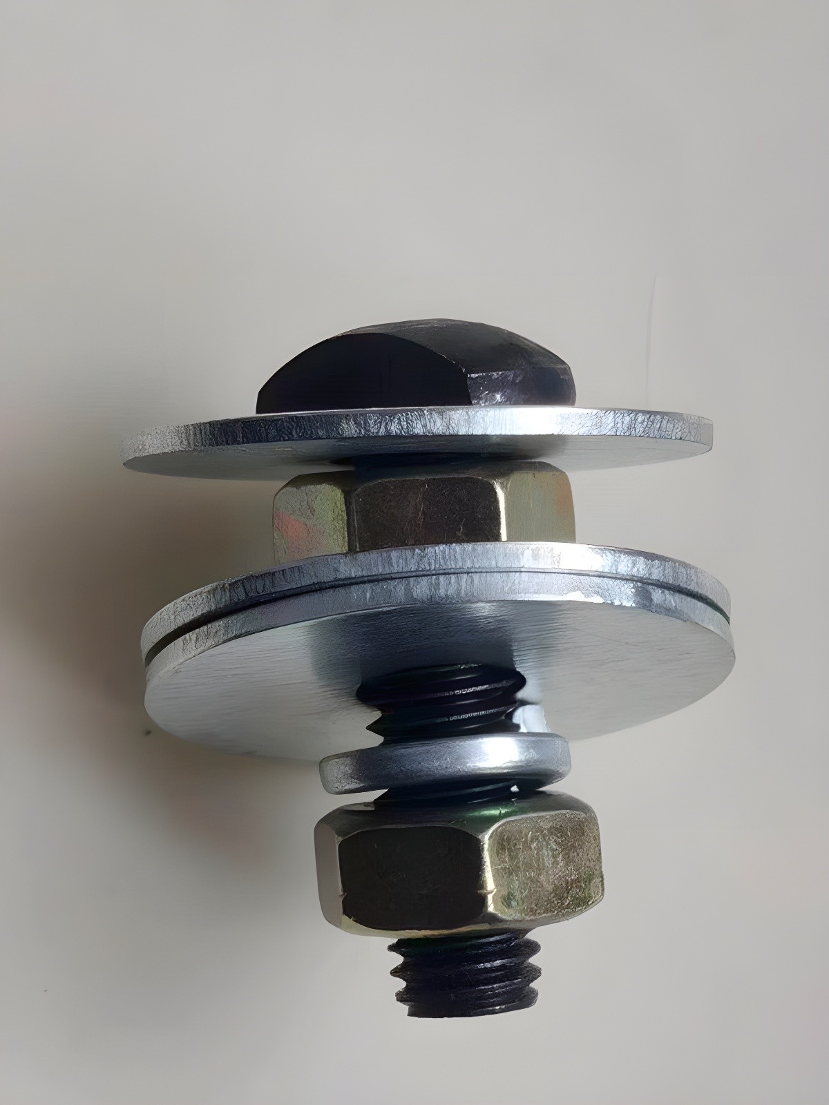 Exploded View of Bolt Assembly Showing Washer Layers