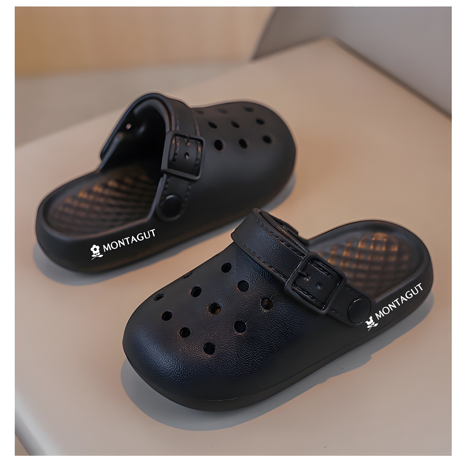 Black MONTAGUT EVA Clogs