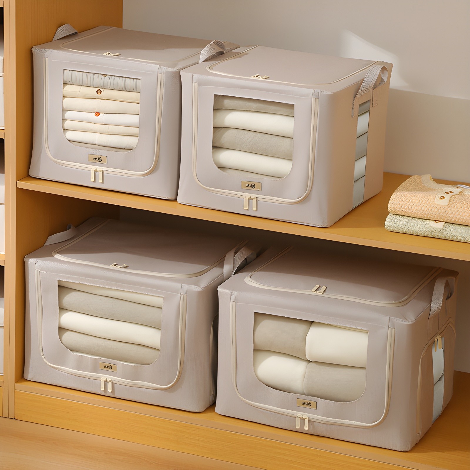 Close-up of a storage box being opened, revealing neatly folded clothes and soft textiles inside