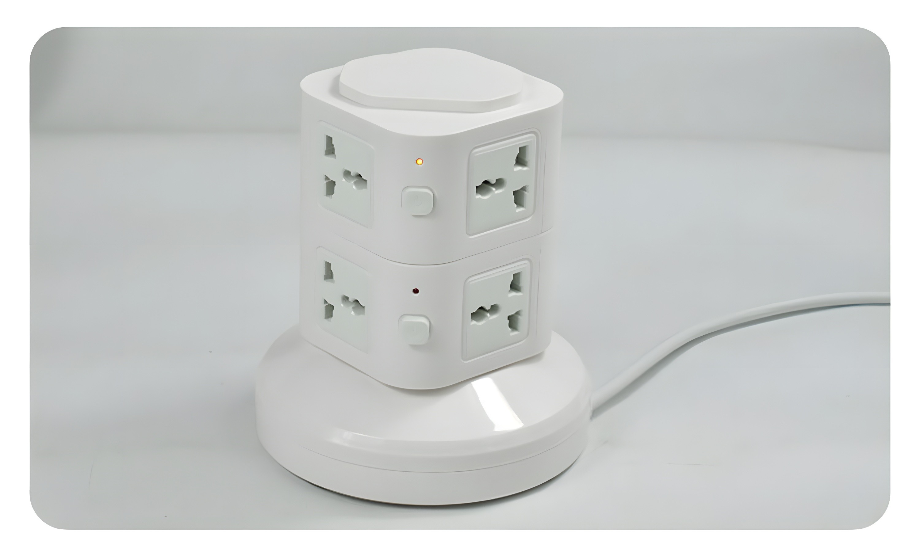Real product photo: Two-layer white tower socket with power indicator and switches
