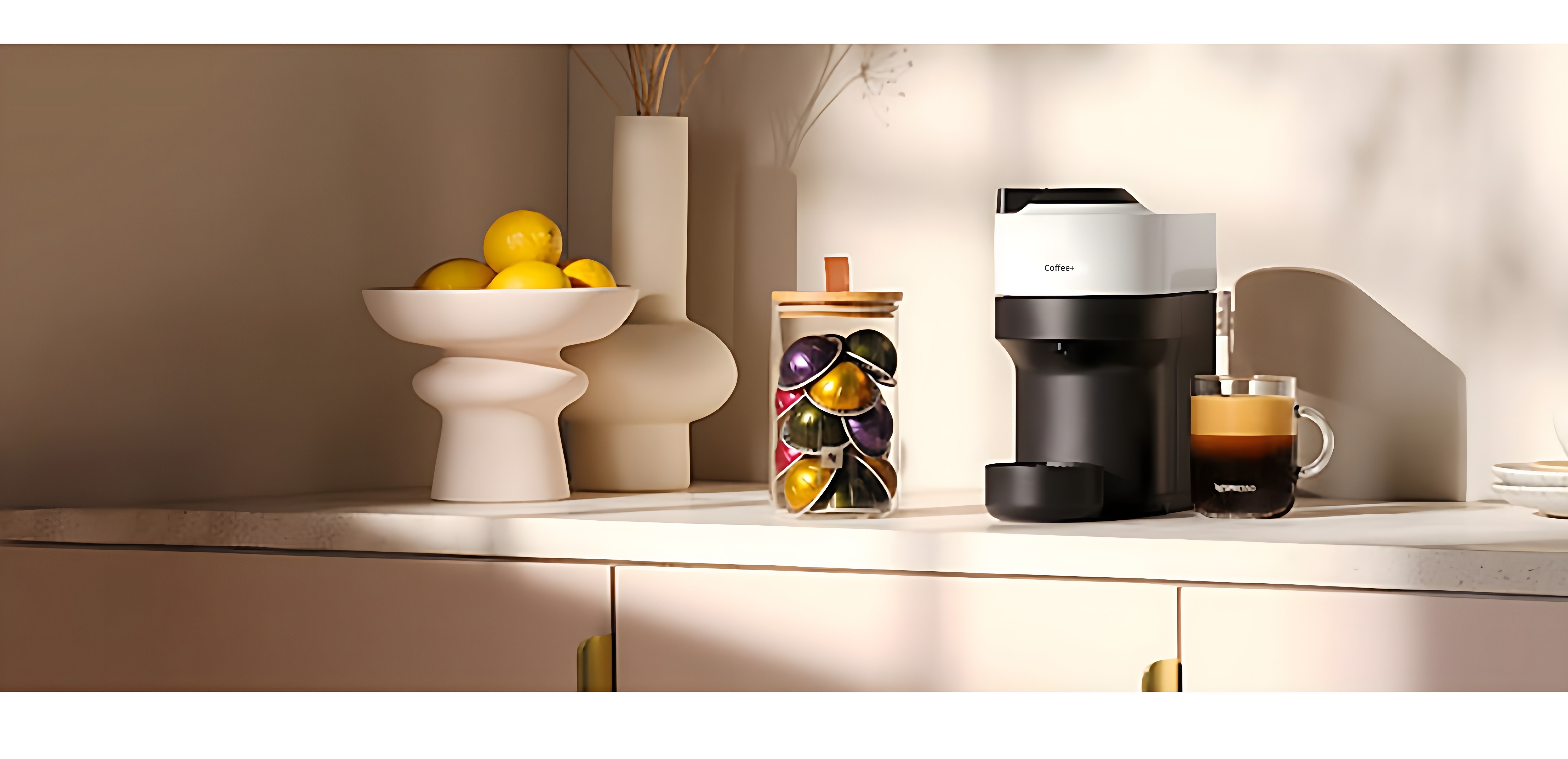 Nespresso Vertuo machine with 'Coffee+' label on modern kitchen counter