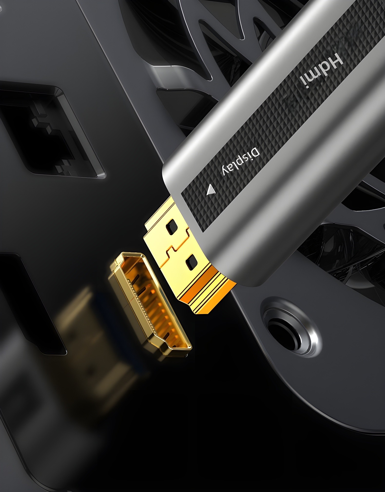 Close-up of HDMI connector with gold plating and 'Display' label