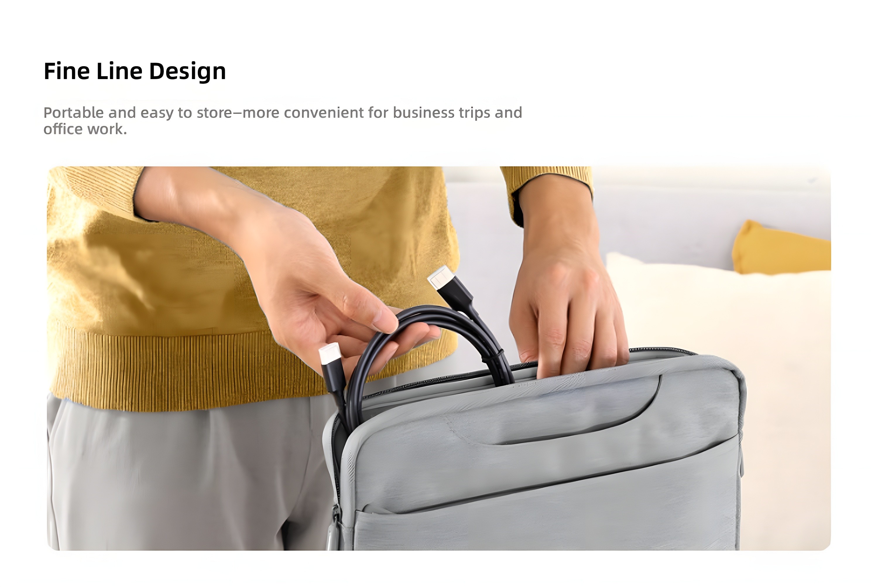 Fine Line Design: person packing the slim GreenLink cable into a laptop sleeve