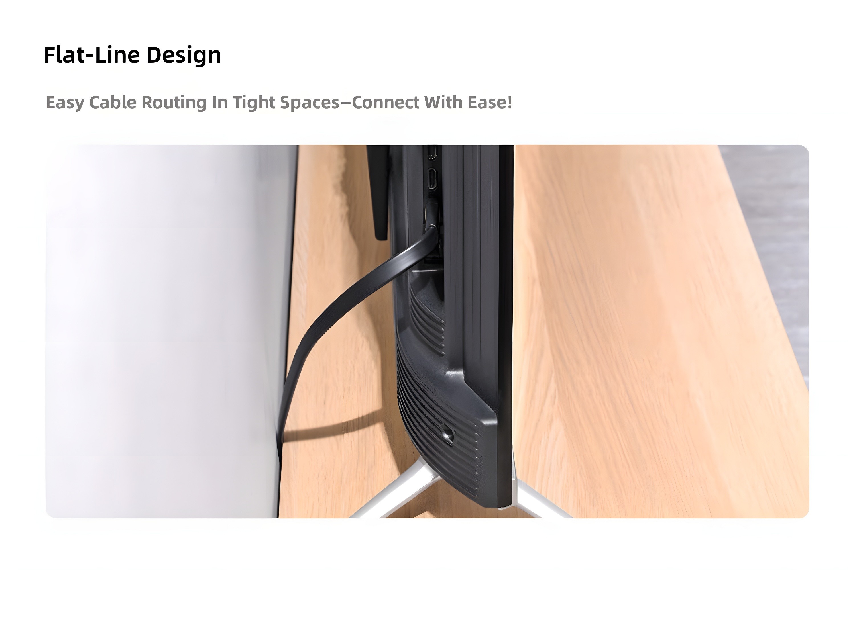 Flat-Line Design: cable neatly routed behind a TV on a wooden stand